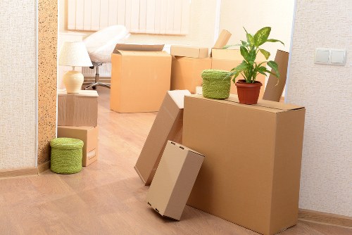 Van man loading furniture for storage