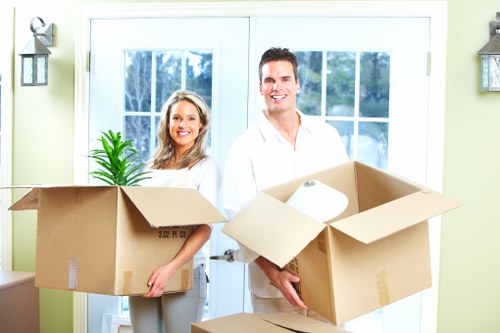 Professional movers handling household items